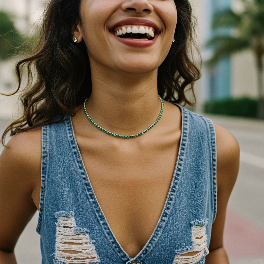 woman wearing a emeralds tennis necklace, happy, miami 